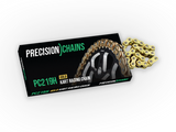 Precision Chains Gold Kart Racing Chain (PC219H) partially extended from black and green packaging, designed for high-performance karting.