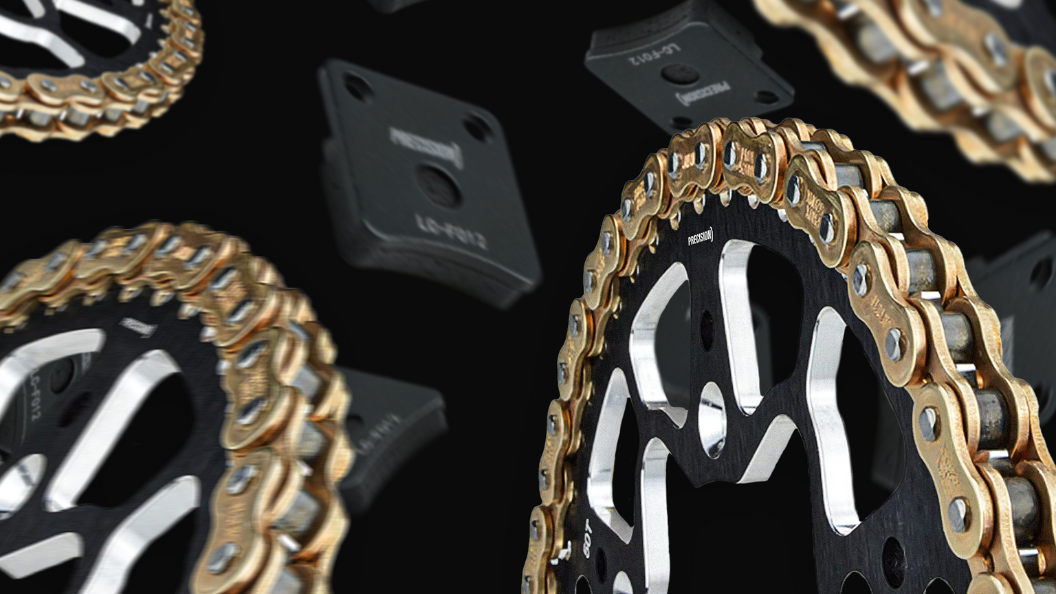 Close-up view of Precision Plus PC219H kart racing chain in black and gold with sprocket, showcasing the chain's robust design and high performance.