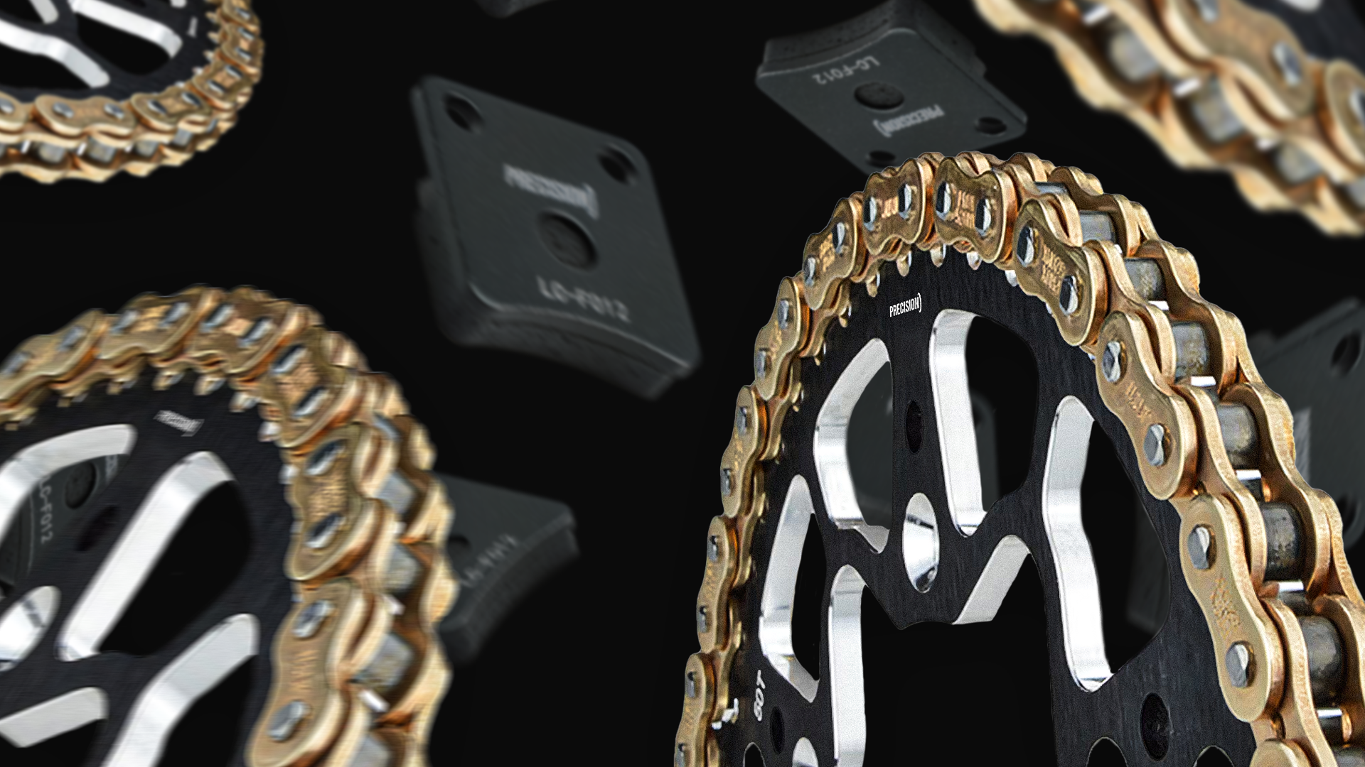 Close-up view of Precision Plus PC219H kart racing chain in black and gold with sprocket, showcasing the chain's robust design and high performance.